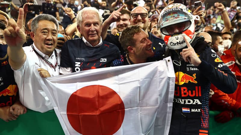 Honda's former Formula 1 managing director Masashi Yamamoto (left( with Marko (centre) and Verstappen