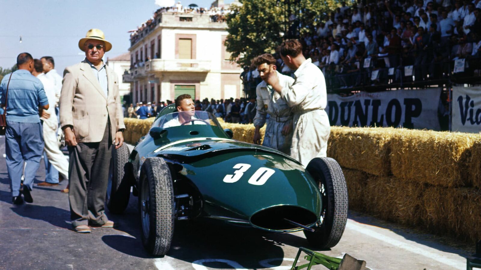 Tony Vandervell stands next to Stewart Lewis Evans in Vanwall