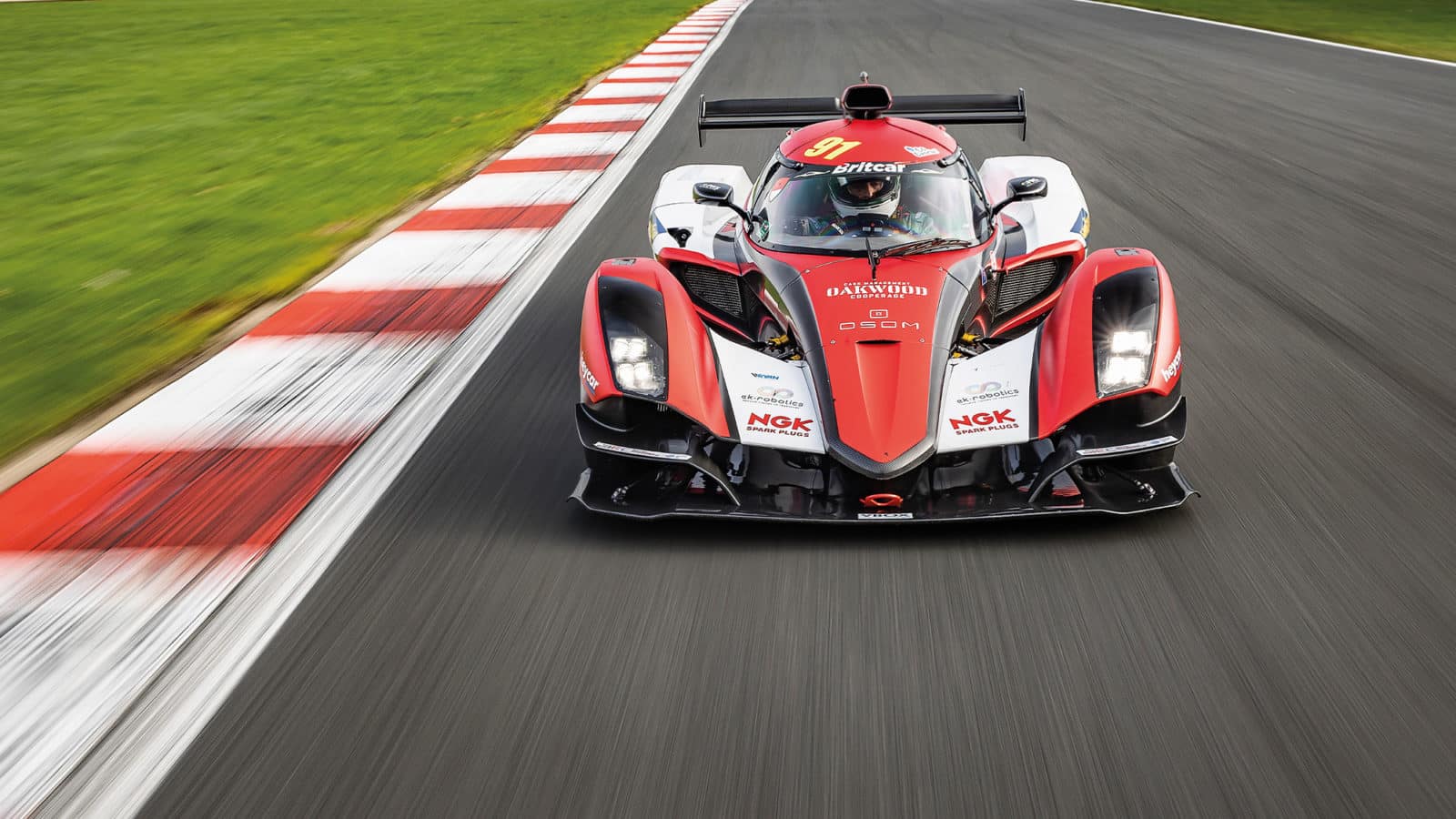 Front on view of Praga R1 on track