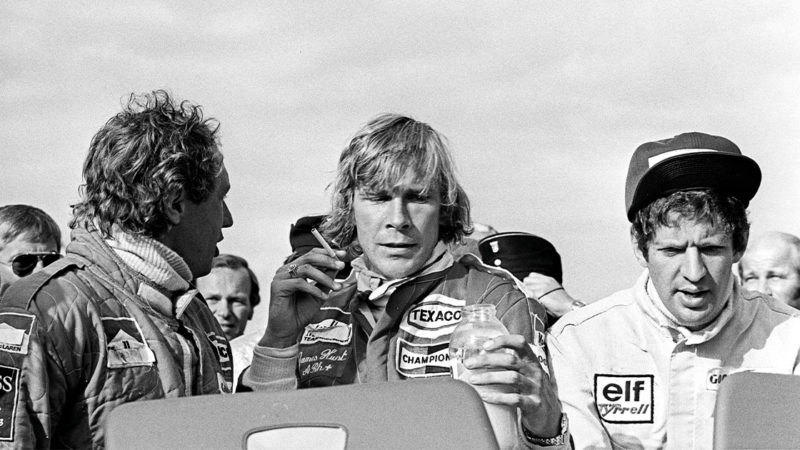 Jochen Mass, James Hunt, Jody Scheckter, Grand Prix of Germany, Nurburgring, 01 August 1976. Moody atmosphere after winning the German Grand Prix, where Niki Lauda nearly lost his life in an accident. (Photo by Bernard Cahier/Getty Images)