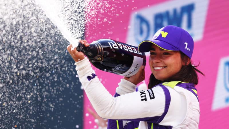 Jamie Chadwick sprays champagne after W Series Red Bull Ring race
