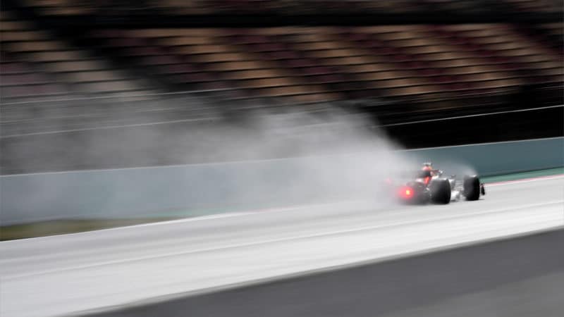 Spray from the Red Bull during wet running in 2022 F1 testing