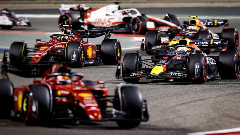 BAHRAIN - Max Verstappen (1) driving the Oracle Red Bull Racing RB18 Honda behind Charles Leclerc (16) with the Ferrari on track during the Bahrain F1 Grand Prix at the Bahrain International Circuit on March 20, 2022 in Bahrain, Bahrain. ANP ROBIN VAN LONKHUIJSEN (Photo by ANP via Getty Images)