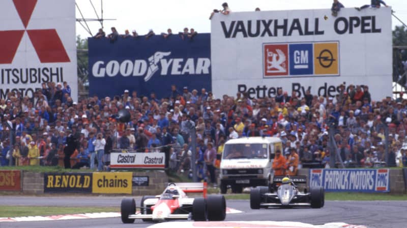 Alain Prost leads Ayrton Senna in the 1985 British GP