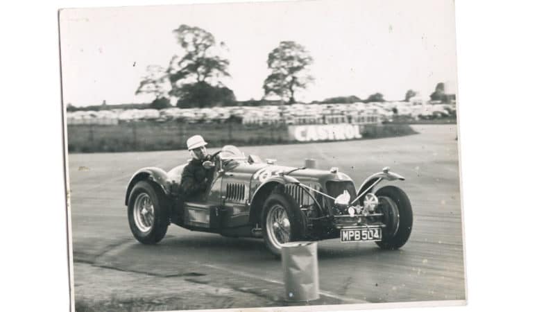 Fred Morley in the ex-Birkin Maserati 8C 3000, running in road trim. Note the helmet