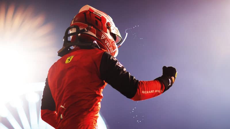 Charles Leclerc pumps his fist after winning the 2022 Bahrain GP
