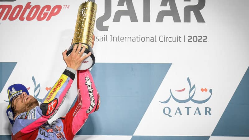 Enea Bastinaini with trophy after winning the 2022 MotoGP Qatar GP