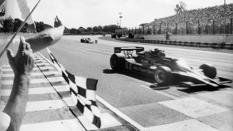 Fangio waves chequered flag in the 1978 Argentinian GP