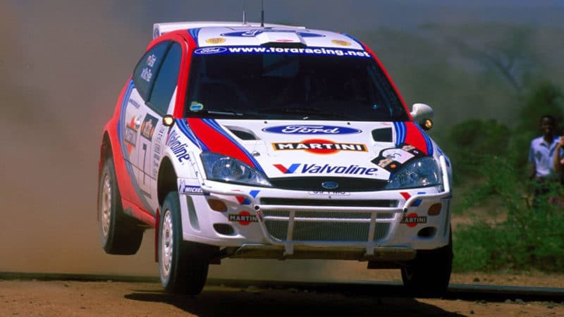 A Ford Focus rides to victory in the Kenya's Safari Rally, the longest, hottest and toughest round of the FIA World Rally Championship March 1, 1999. The Ford Martini World Rally Team drivers Colin McRae and Nicky Grist brought their car home over 7 minutes ahead of their nearest rival to record the first rally win for the Focus in only its third event. (photo by Ford Motor Company)