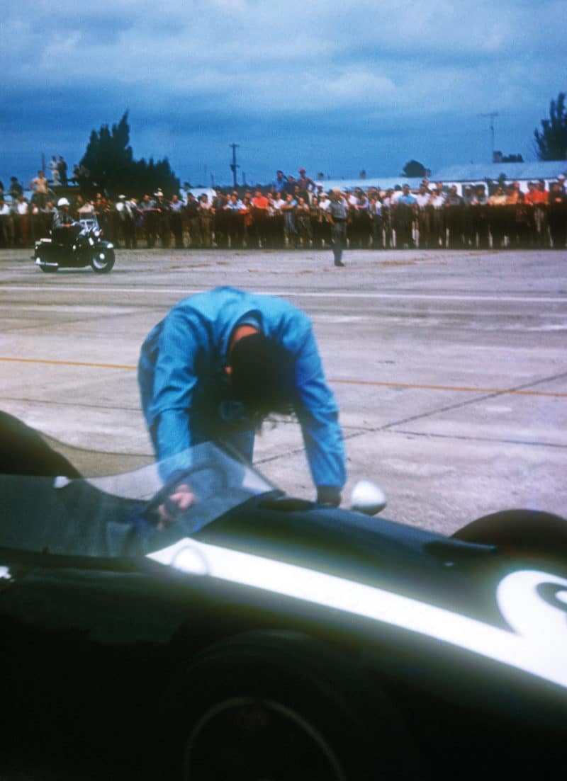 Jack-Brabham-pushes-car-across-the-line