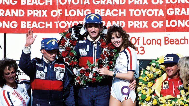 John-Watson-on-the-top-of-the-Long-Beach-US-GP-podium