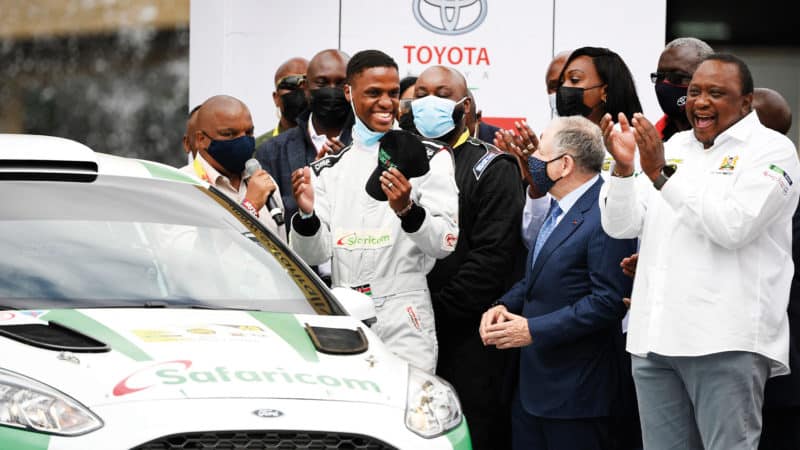 Kimathi, FIA’s then-president Jean Todt and Kenya president Uhuru Kenyatta at the 2021 Safari Rally Kenya