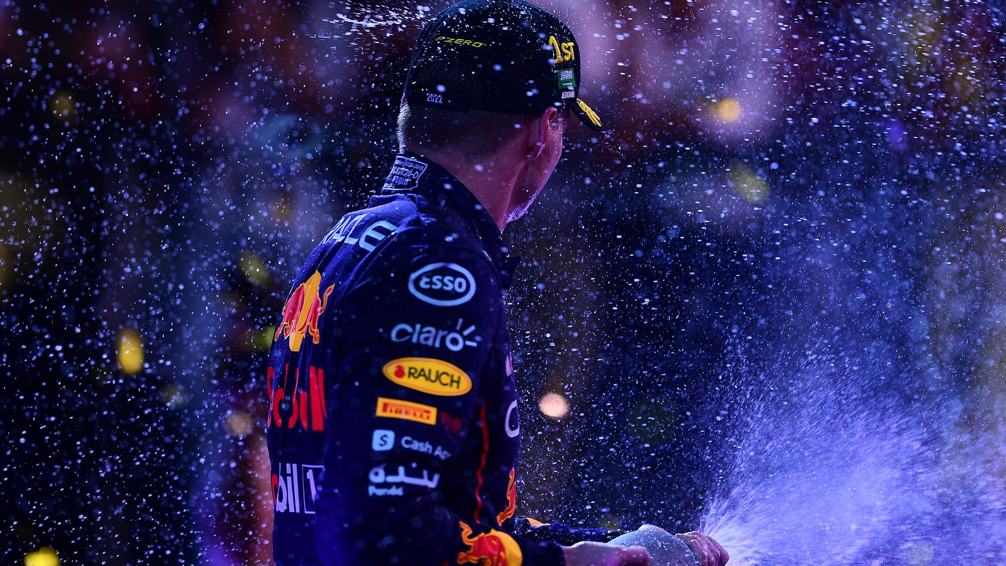 Max Verstappen sprays champagne after winning the 2022 Saudi Arabian Grand Prix