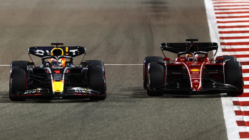 Max Verstappen and Charles Leclerc side by side in the 2022 Bahrain Grand Prix