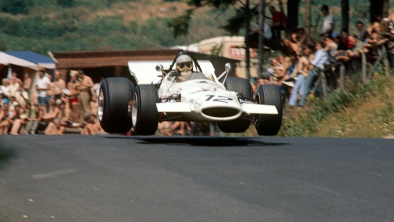 McLaren Cosworth of Vic Elford in mid air at the Nurburgring 1969