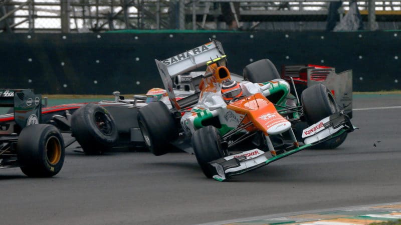 Nico Hulkenberg crashes with Lewis Hamilton in the 2012 Brazilian Grand Prix