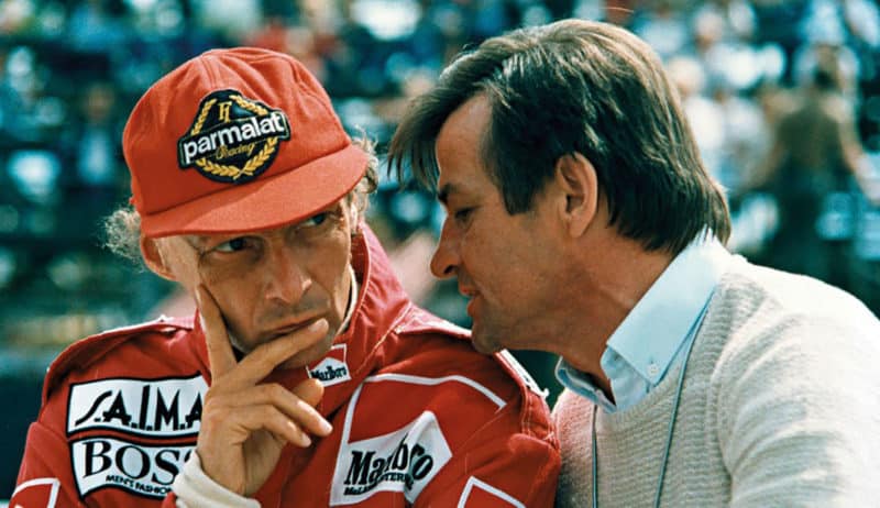 Niki-Lauda,-Hans-Mezger,-l-r,-1984,-Porsche-AG