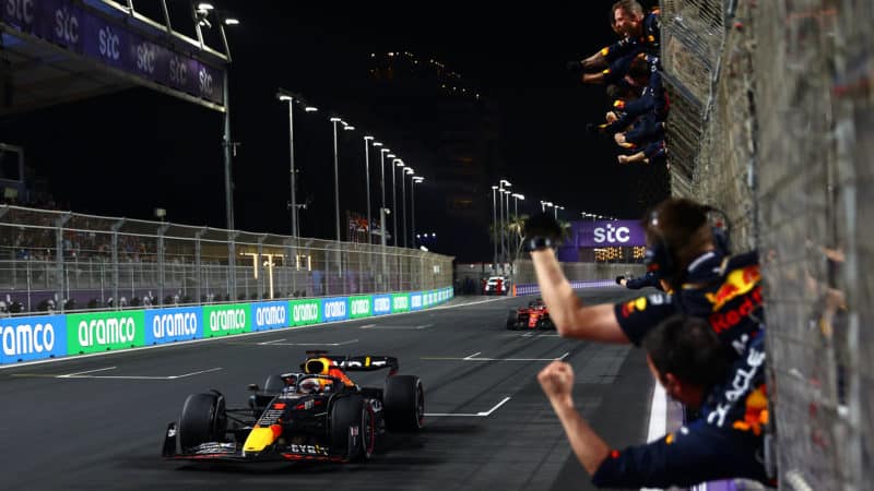 Red Bull crew cheer as Max Verstappen wins the 2022 F1 Saudi Arabian Grand Prix