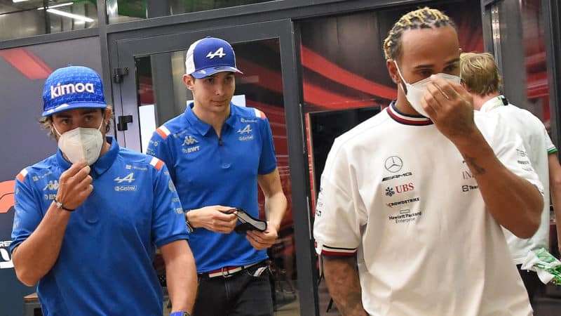 Fernando Alonso, Esteban Ocon (both Alpine-Renault) and Lewis Hamilton after drivers meeting after FP2 practice for the 2022 Saudi Arabian Grand Prix at the Jeddah Corniche Corcuit. Photo: Grand Prix Photo