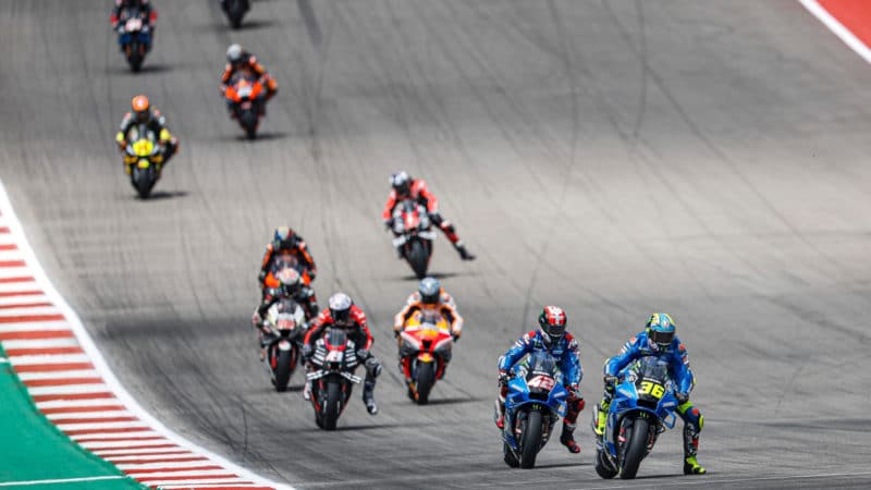 Alex Rins and joan Mir at the head of the pack in the 2022 MotoGP Americas GP