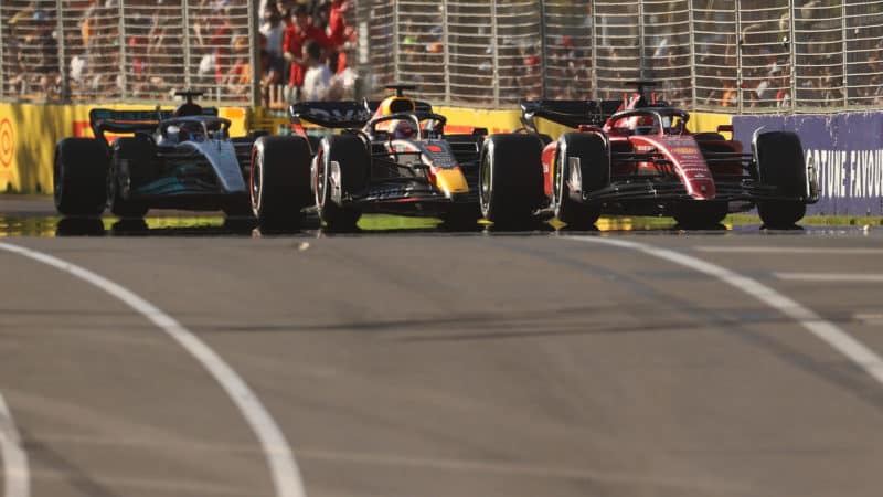 Charles Leclerc leads Max Verstappen and George Russell in the 2022 Australian Grand Prix
