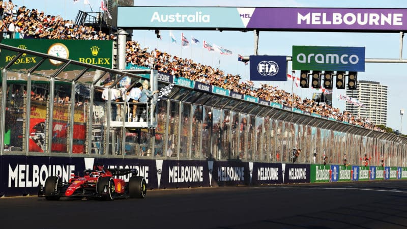Charles Leclerc takes the chequered flag to win the 2022 Australian GP