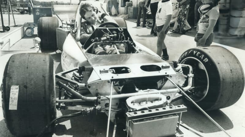 Gilles Villeneuve sits in cockpit of Formula Atlantic car