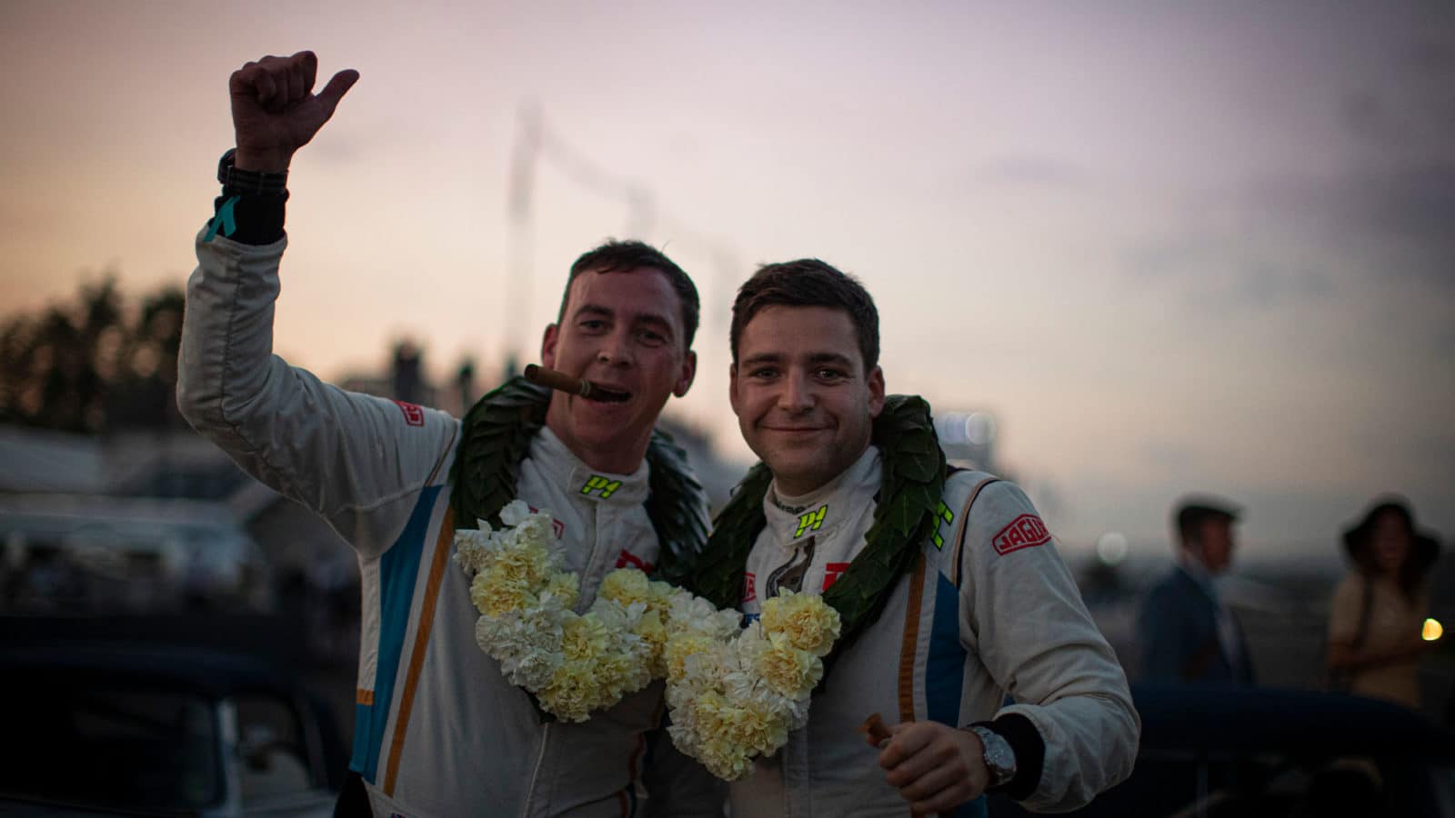 Harvey Stanley (right) celebrates victory at the 2021 Goodwood Revival with DK colleague and established historic racer James Cottingham