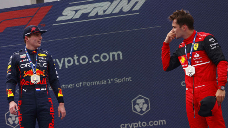 Max Verstappen talks to Charles Leclerc on 2022 Emilia Romagna F1 sprint race podium