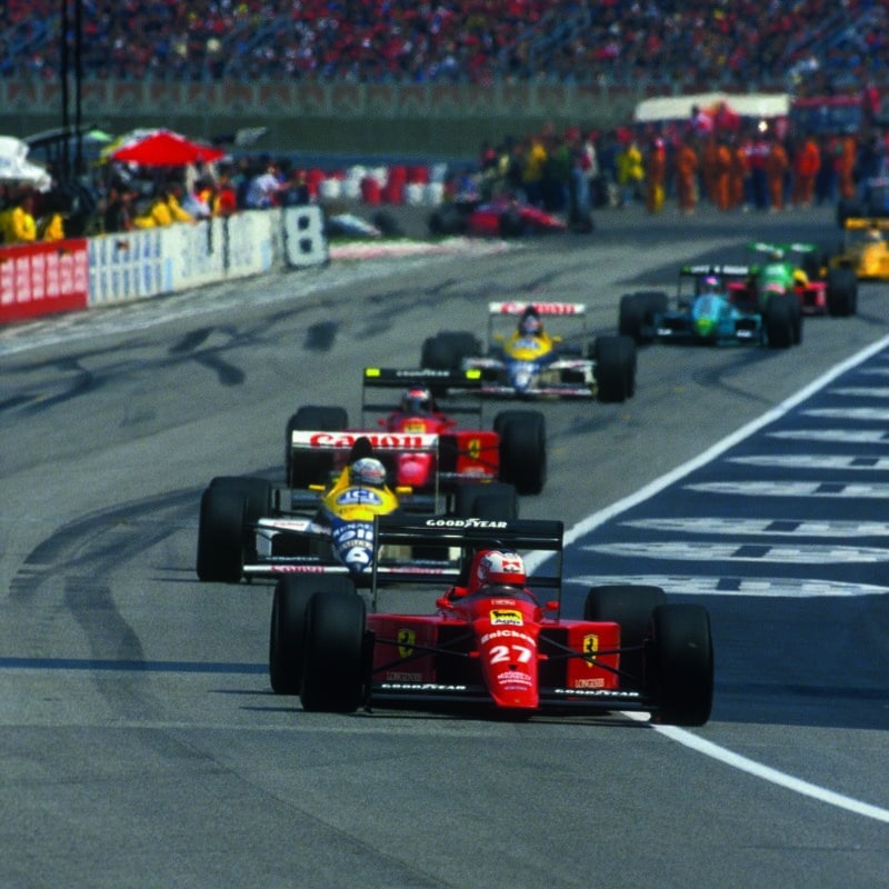 Nigel-Mansell-leads-for-Ferrari-at-the-1989-San-Marino-Grand-Prix