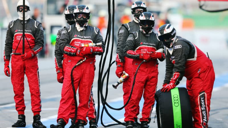 Porsche DTM pit crew wait for car