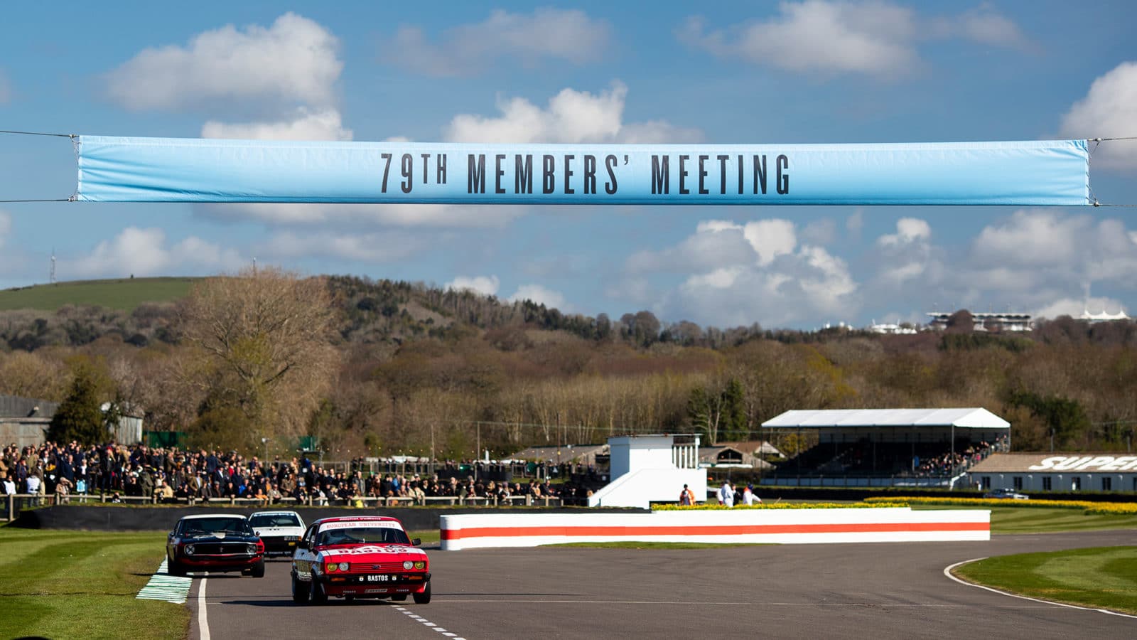 Saloon cars racing at the 79th Goodwood Members Meeting in 2022