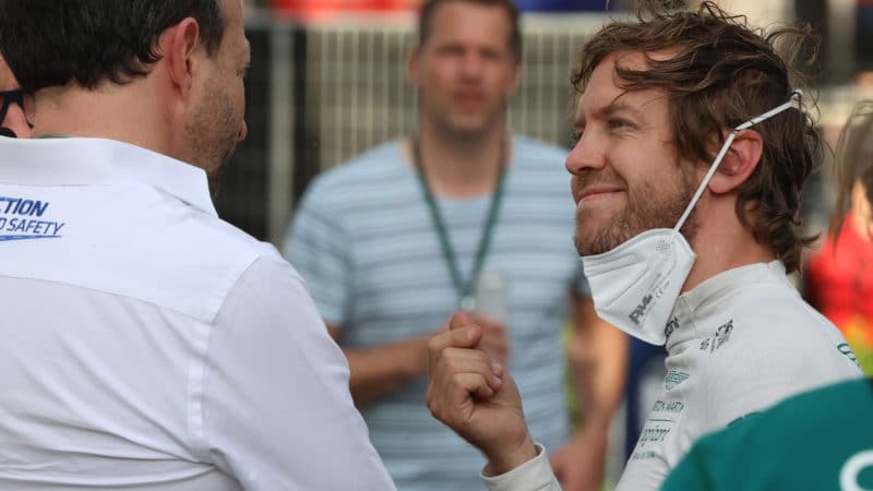 Sebastian Vettel rubbing his fingers together at the 2022 Australian Grand Prix