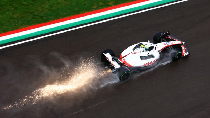 Sparks and spray from Haas F1 car at Imola