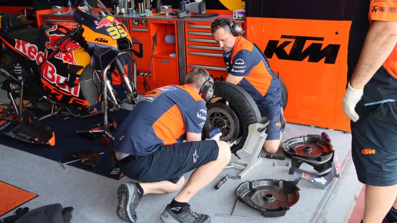 Tyres and calipers being removed from KTM MotoGP bike