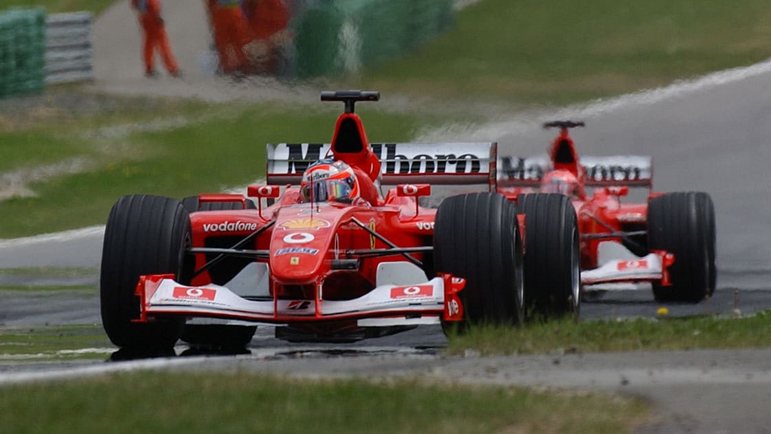 AUTO - F1 2002 - AUSTRIA GP - ZELTWEG 20020512 - PHOTO: THIERRY BOVY / DPPI N¡2 - RUBENS BARRICHELLO (BRA) / FERRARI - ACTION_N¡ 1 - MICHAEL SCHUMACHER (GER) / FERRARI - ACTION
