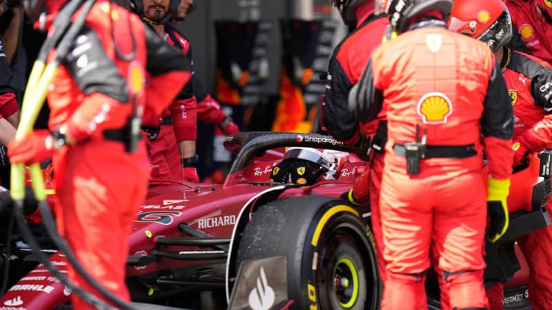 Ferrari's Monegasque driver Charles Leclerc reacts as he makes a pitstop during the Spanish Formula One Grand Prix at the Circuit de Catalunya on May 21, 2022 in Montmelo, on the outskirts of Barcelona. (Photo by Manu Fernandez / POOL / AFP) (Photo by MANU FERNANDEZ/POOL/AFP via Getty Images)