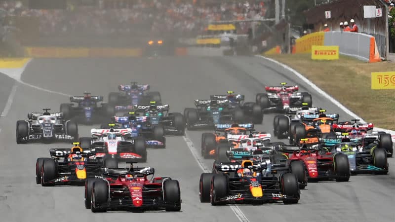 Drivers speed up at the start of the Spanish Formula One Grand Prix at the Circuit de Catalunya on May 21, 2022 in Montmelo, on the outskirts of Barcelona. (Photo by LLUIS GENE / AFP) (Photo by LLUIS GENE/AFP via Getty Images)
