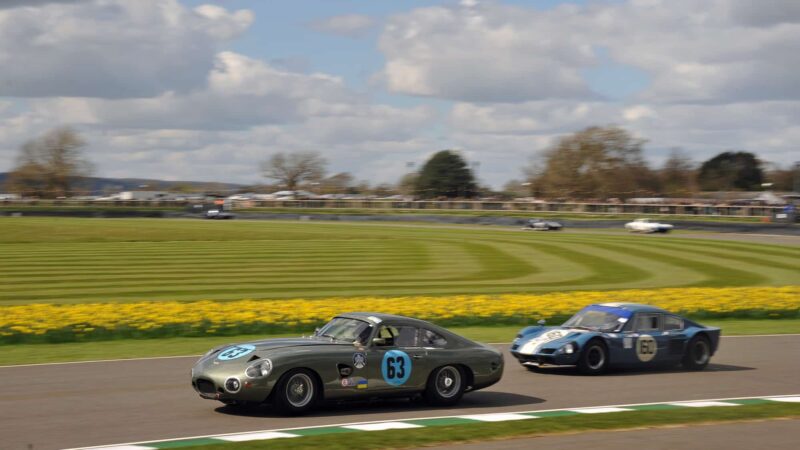 Aston Martin DP214 leads Elva GT160 at 2022 Goodwood Members Meeting