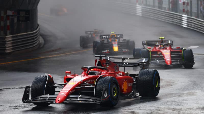 Charles Leclerc leads at the rolling start of the 2022 Monaco Grand Prix