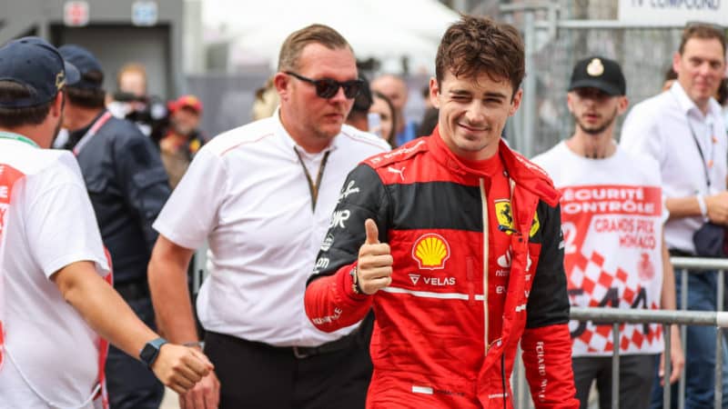 Charles Leclerc winks and puts his thumb up after securing pole for the 2022 Monaco Grand Prix