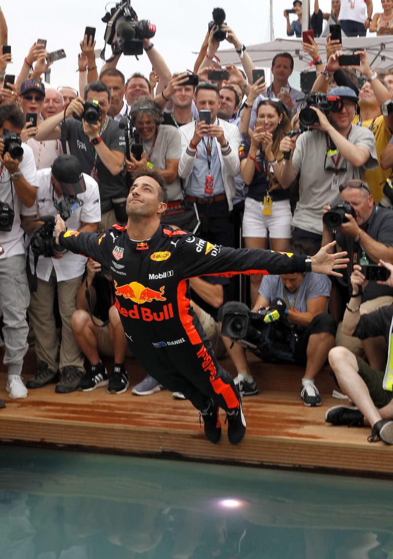 Daniel-Ricciardo-dives-in-to-Red-Bull-pool-after-winning-the-2022-Monaco-Grand-Prix