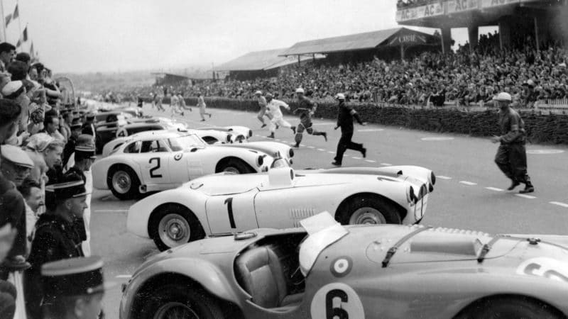 Drivers run to their cars at the start of the 1952 Le Mans 24 Hours