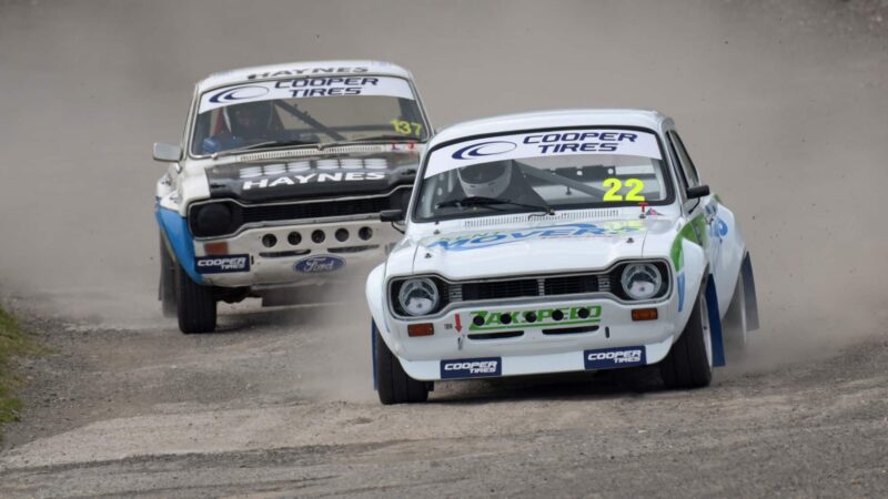 Dust cloud behind Mk1 Escorts at Lydden Hill rallycross