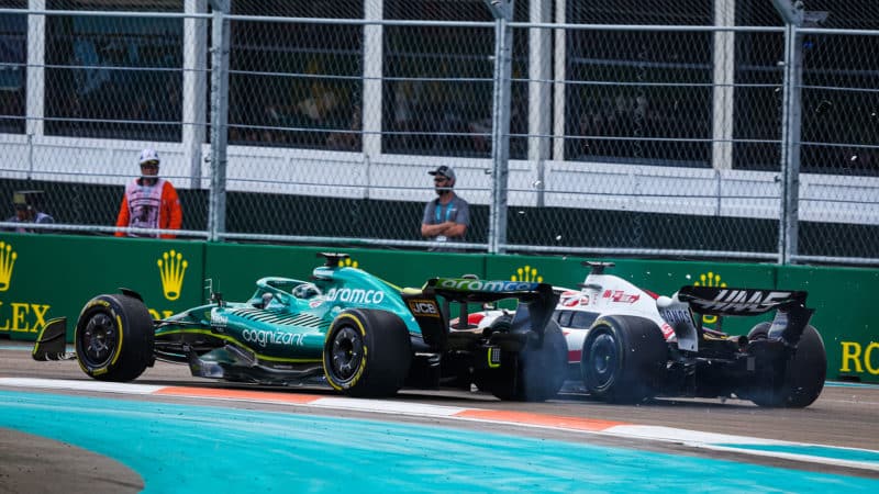 Lance Stroll and Kevin Magnussen battle in the 2022 Miami Grand Prix
