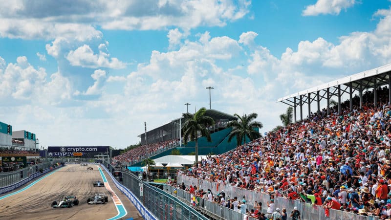 Lewis Hamilton overtakes Pierre Gasly in front of packed stands at the 2022 Miami Grand Prix