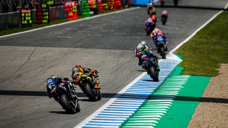 Line of mid-pack riders in the 2022 MotoGP Spanish GP