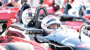 Mario Andretti in two seat F1 car