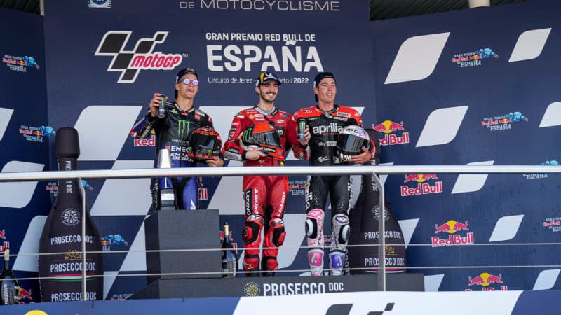 Pecco Bagnaia Fabio Quartararo and Aleix Espargaro on the podium at the 2022 MotoGP Spanish GP