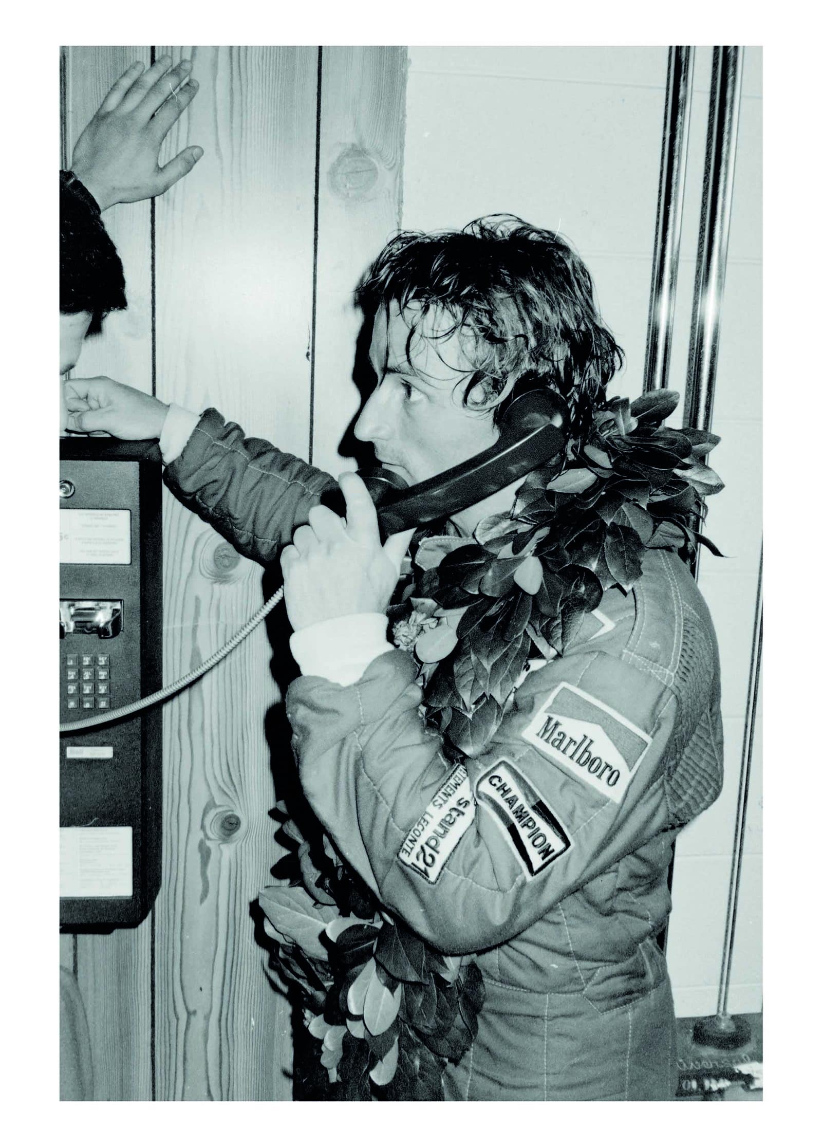 Rene-Arnoux-makes-a-call-from-a-pay-phone